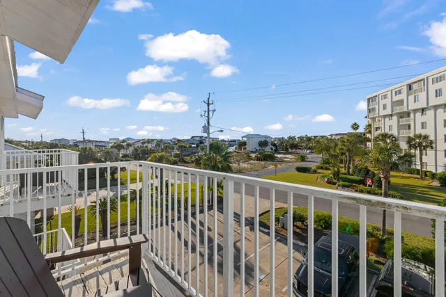 a view of a balcony with city view