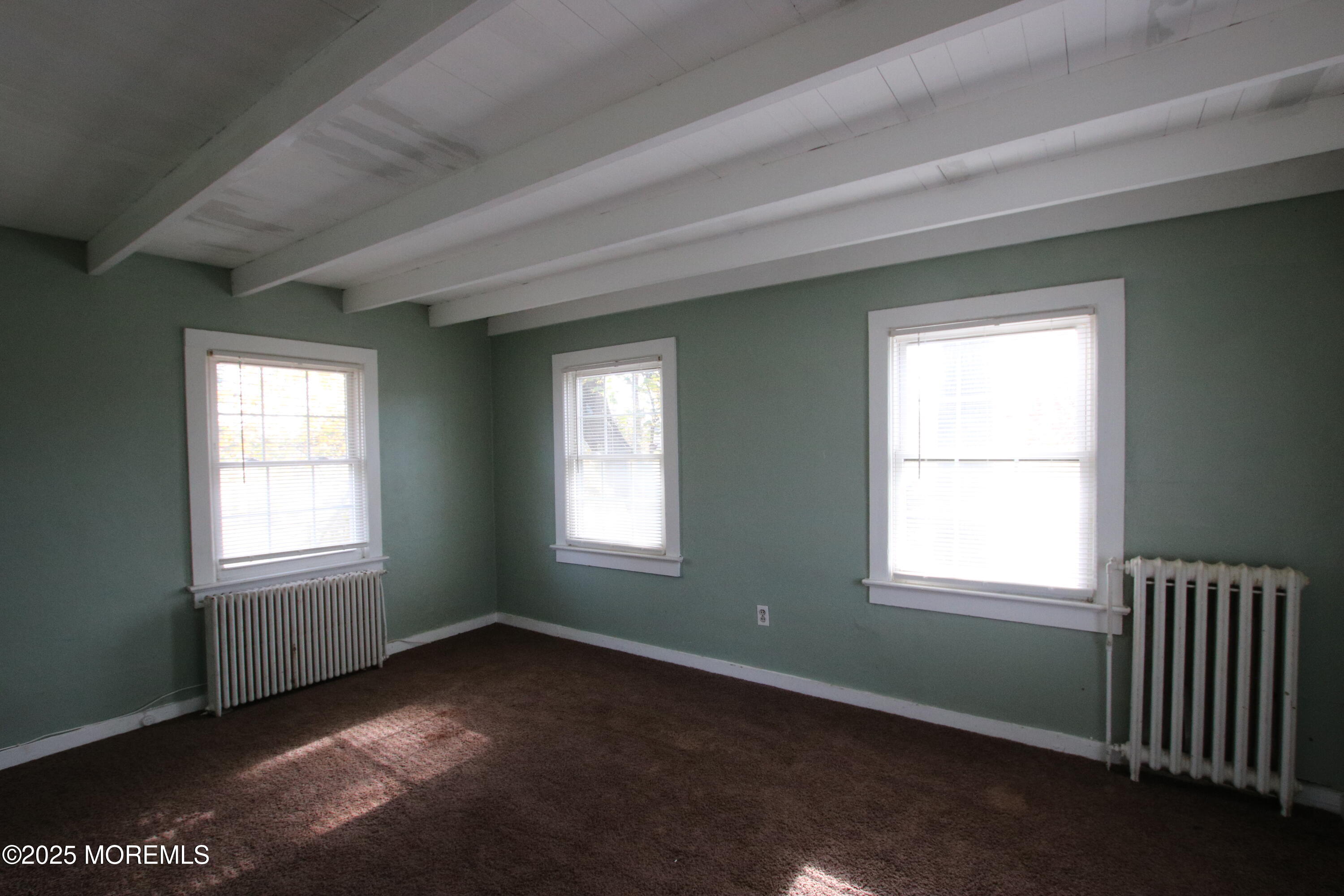 185 Monmouth Road West Long Branch, NJ 07764 - Photo 11 of 28 an empty room with a window