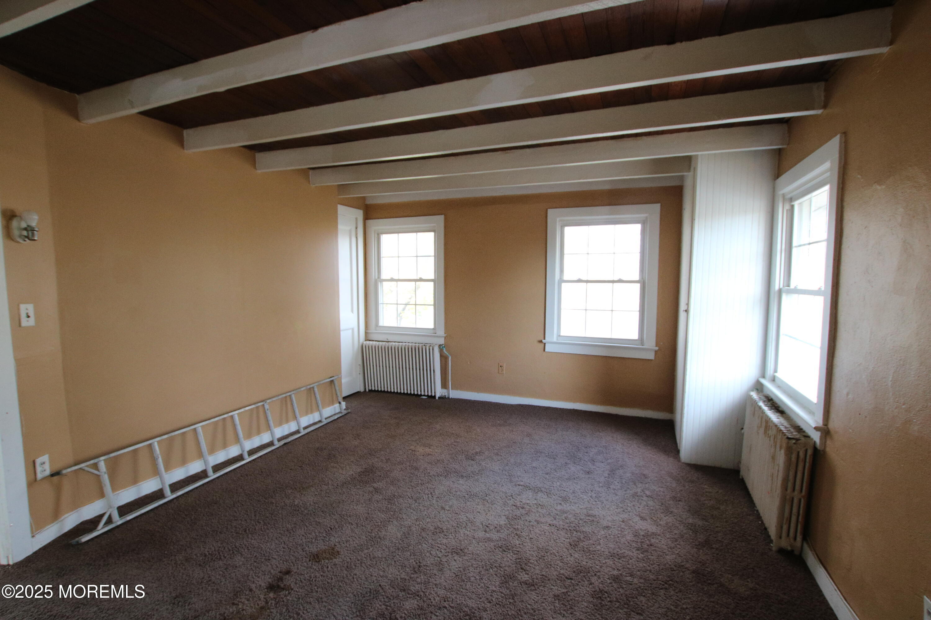 185 Monmouth Road West Long Branch, NJ 07764 - Photo 14 of 28 a view of an empty room with a window