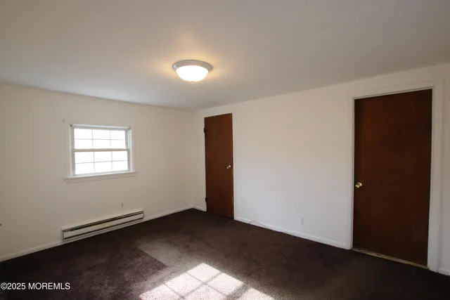 an empty room with a door