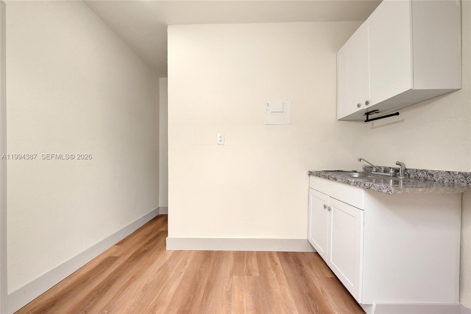 5632 Southwest 19th Street West Park, FL 33023 - Photo 20 of 43 a view of a room with racks on the wall