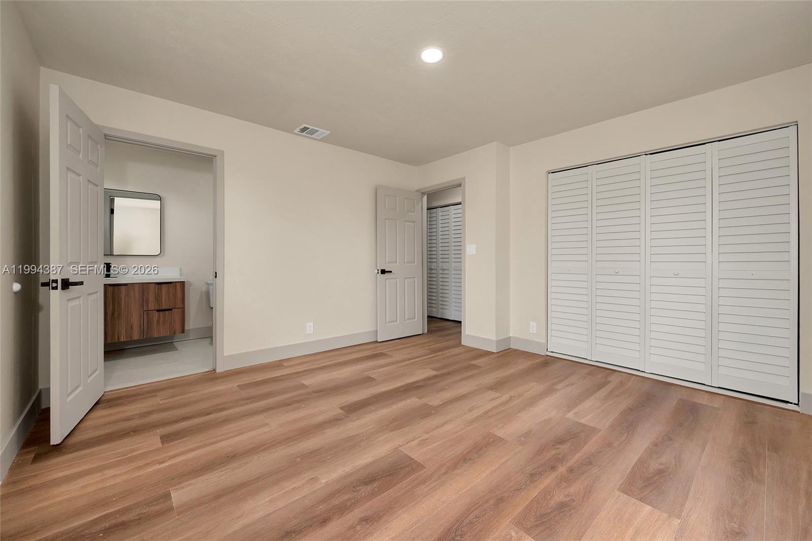 5632 Southwest 19th Street West Park, FL 33023 - Photo 28 of 43 a view of an empty room with a window