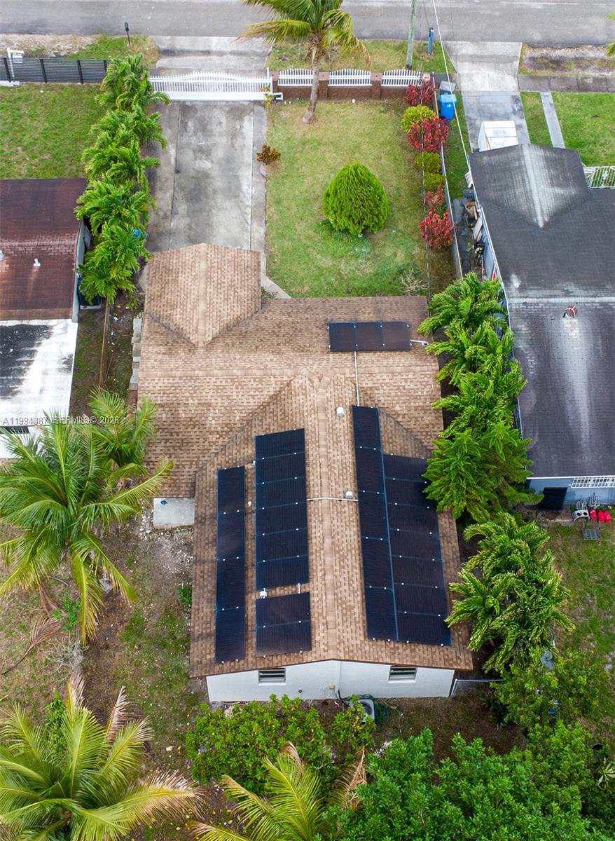 5632 Southwest 19th Street West Park, FL 33023 - Photo 32 of 43 an aerial view of a house with a yard and potted plants