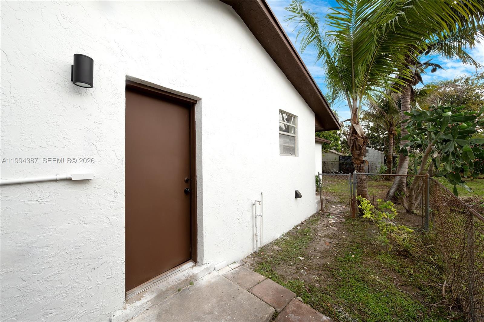 5632 Southwest 19th Street West Park, FL 33023 - Photo 43 of 43 a view of a house with a backyard
