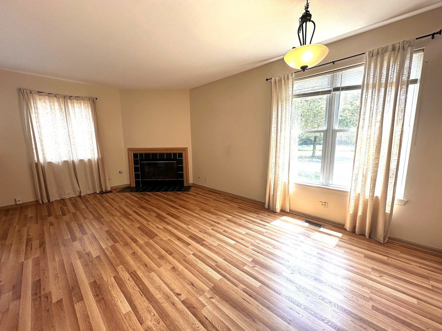 1152 Vail Court Naperville, IL 60540 - Photo 3 of 11 a bedroom with a bed and a window