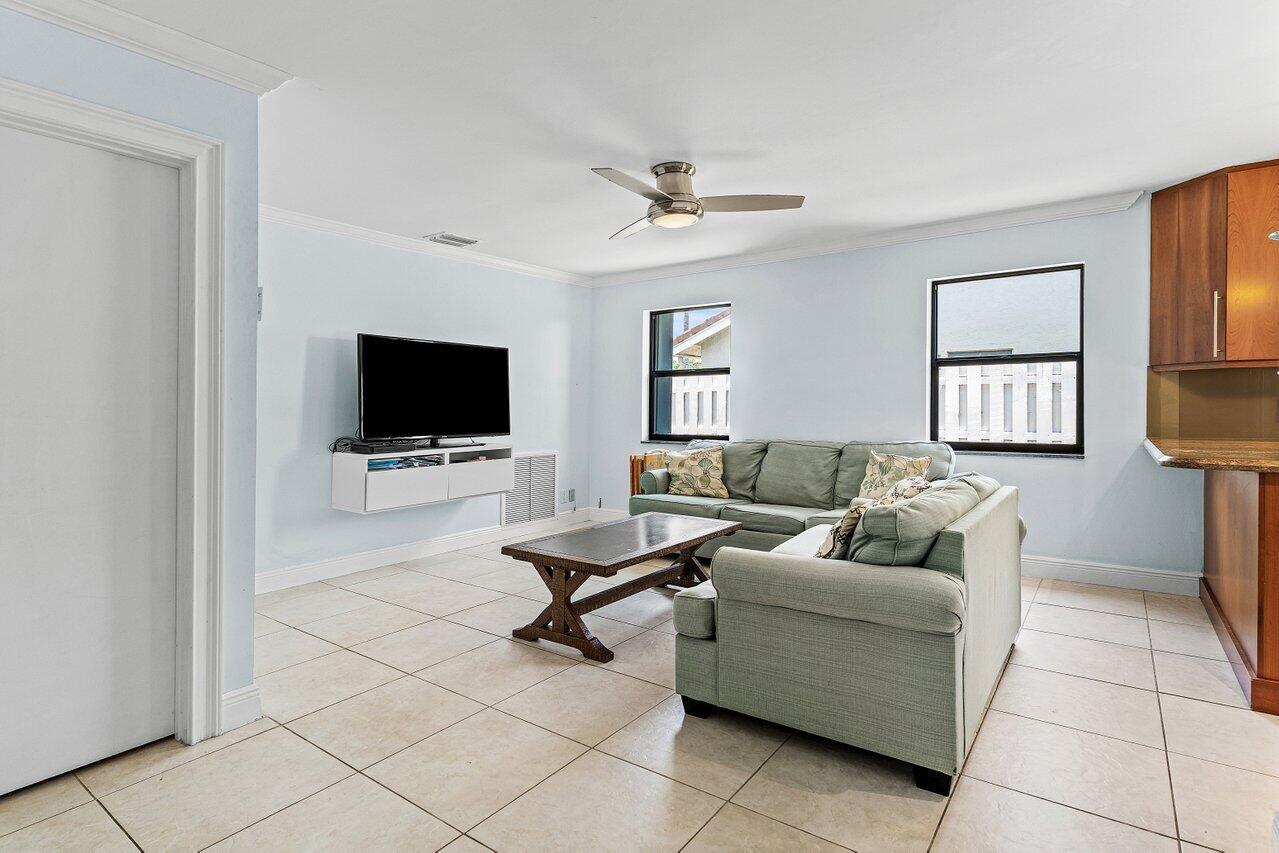 7800 Texas Trail Boca Raton, FL 33487 - Photo 13 of 33 a living room with furniture and a flat screen tv
