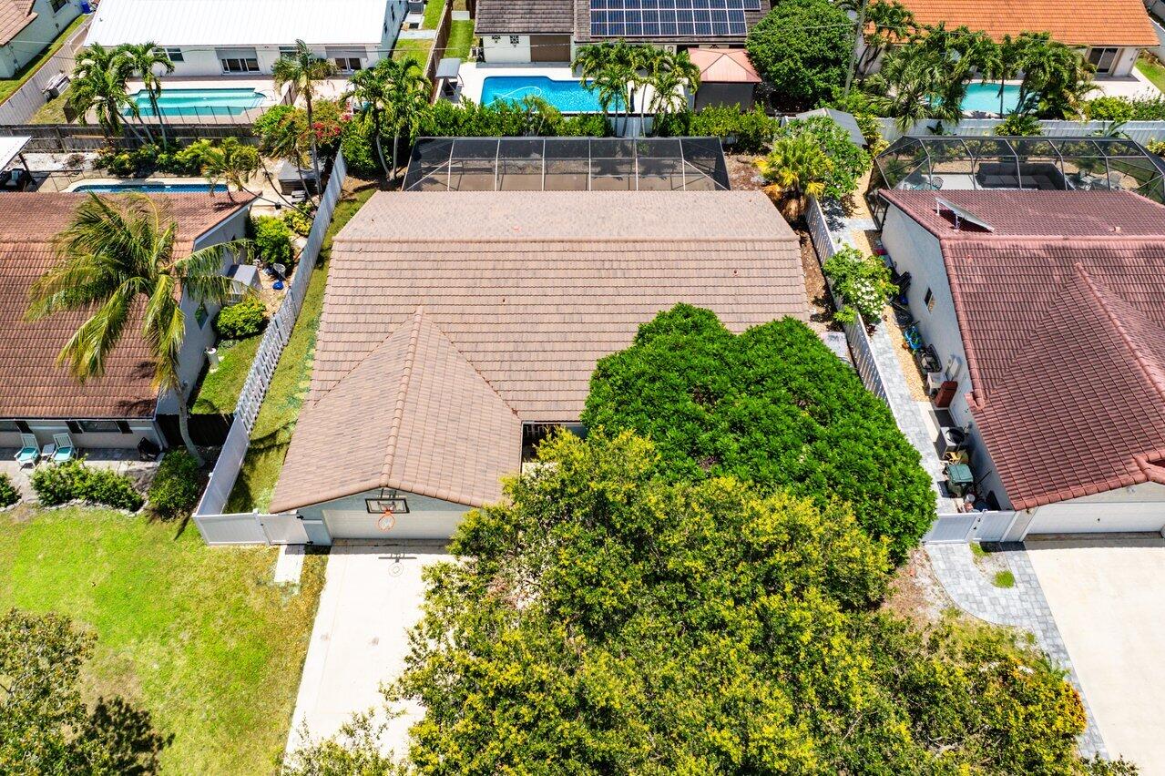 7800 Texas Trail Boca Raton, FL 33487 - Photo 28 of 33 an aerial view of a house with a yard and potted plants