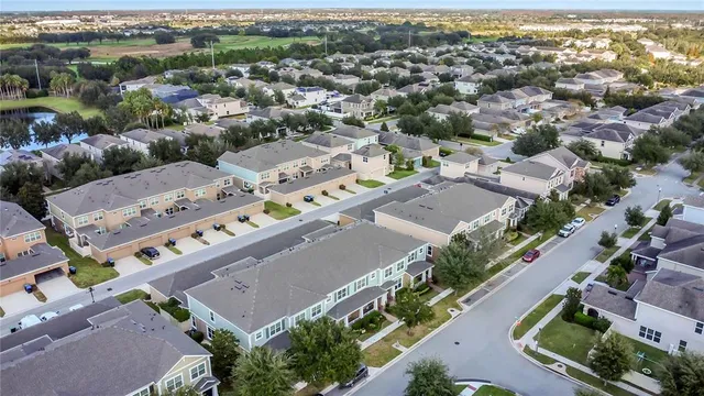 an aerial view of a city with lots of residential buildings