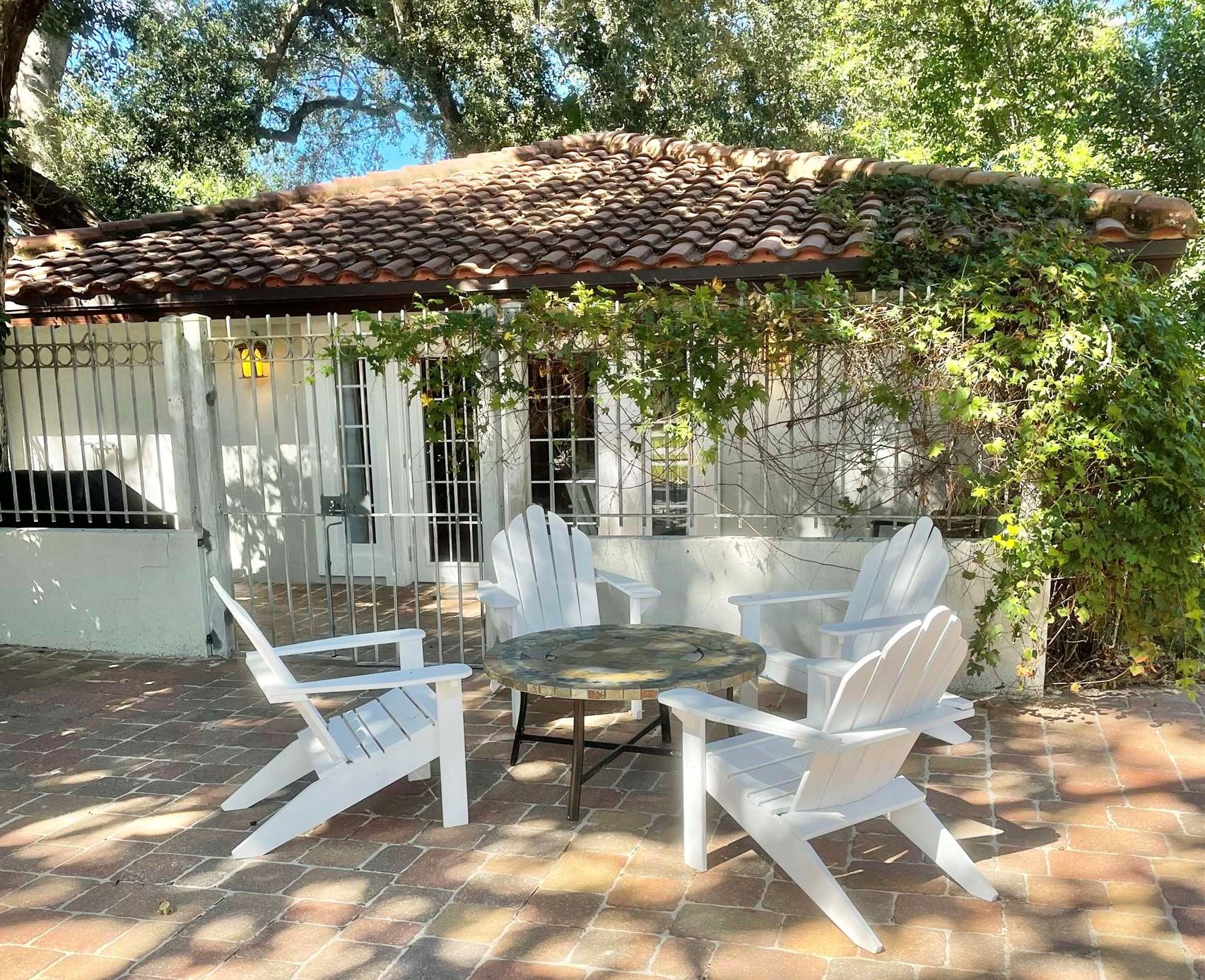 694 16th Street St. Augustine Beach, FL 32080 - Photo 2 of 14 a patio with table and chairs