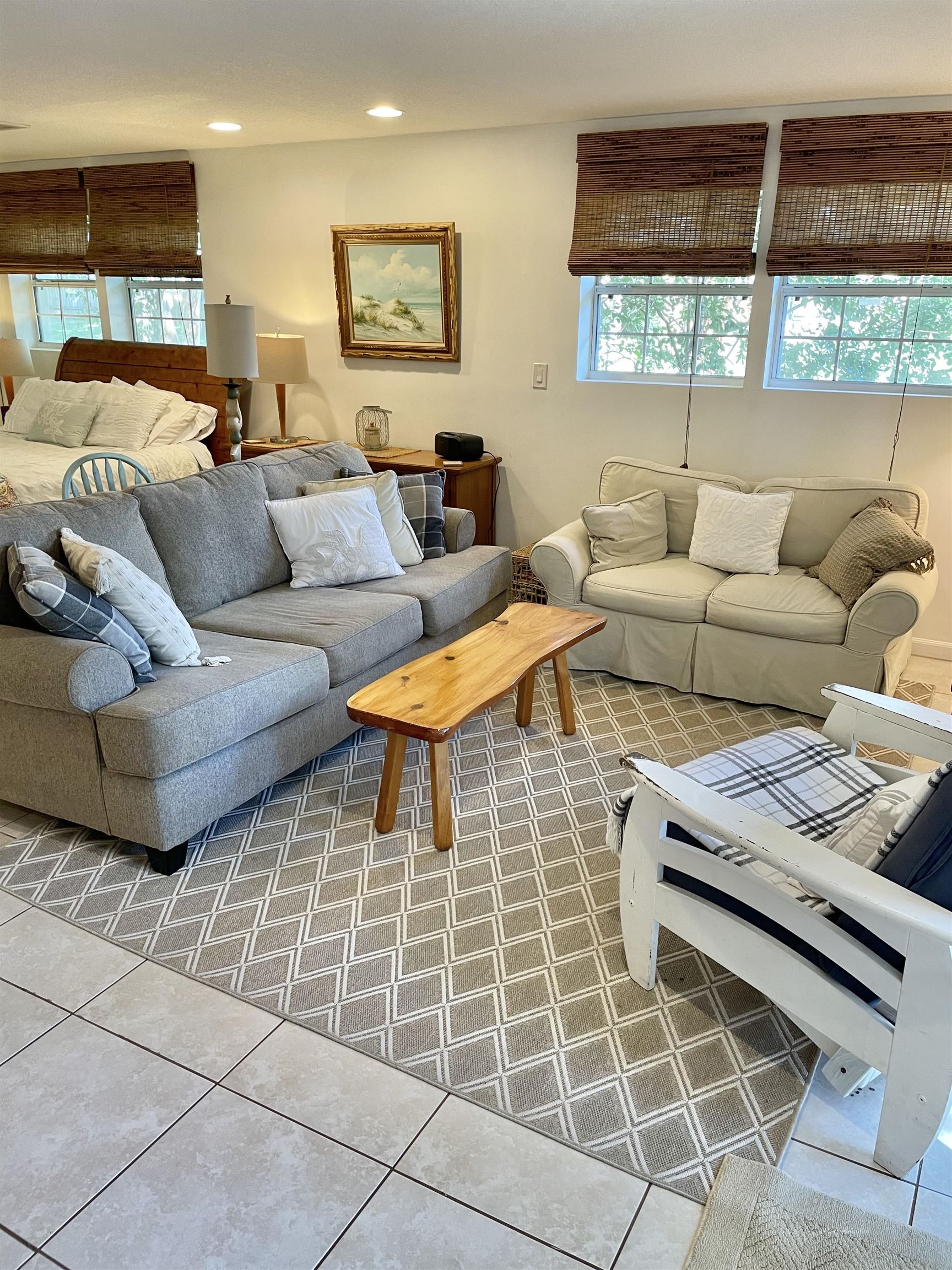 694 16th Street St. Augustine Beach, FL 32080 - Photo 8 of 14 a living room with furniture and a window