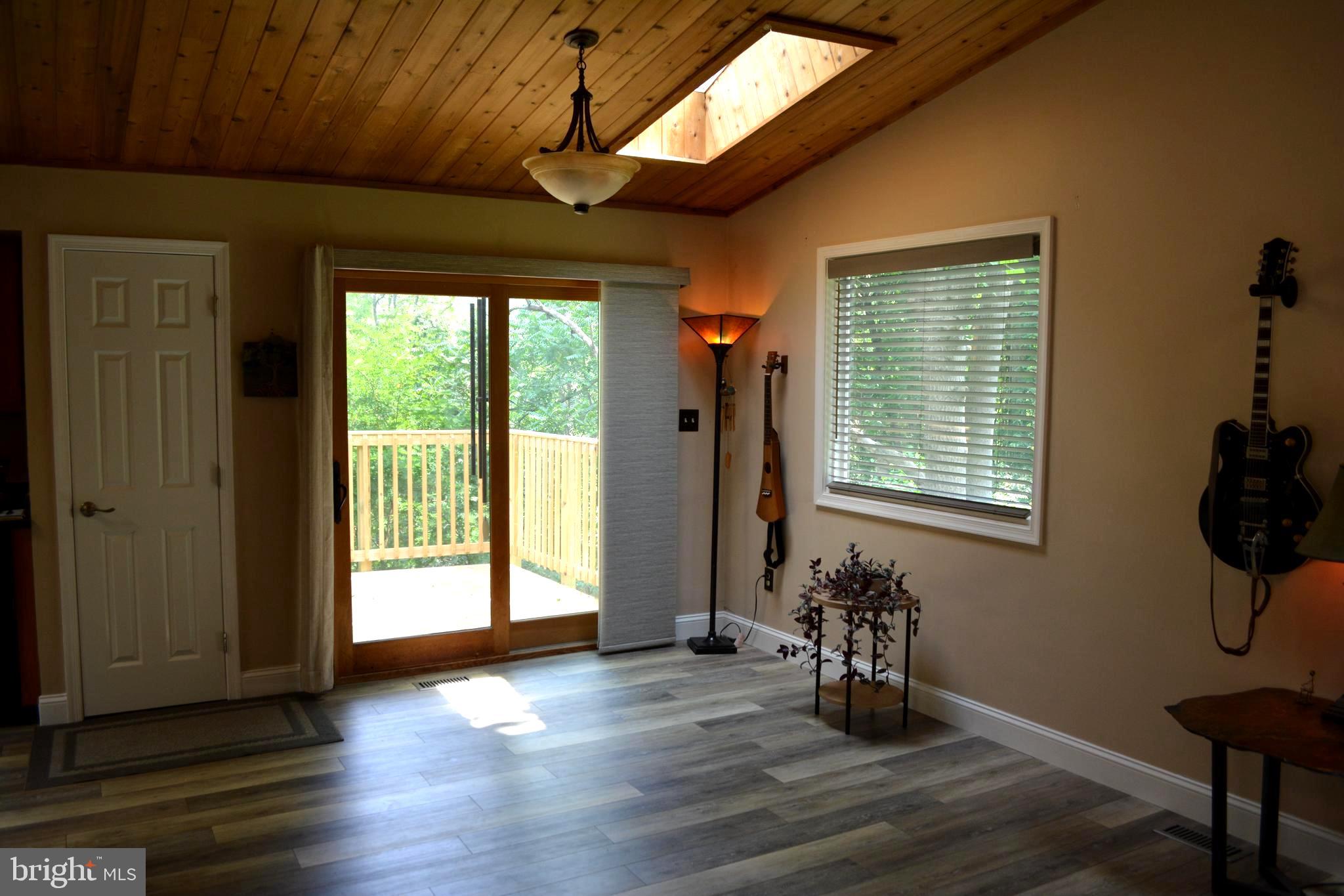 348 Rome Beauty Drive Linden, VA 22642 - Photo 15 of 80 Sliding doors to deck & picture window in dining
