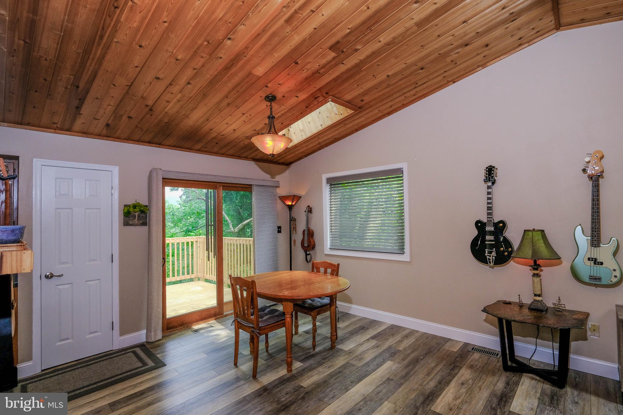 348 Rome Beauty Drive Linden, VA 22642 - Photo 27 of 80 Sliding doors to deck & picture window in dining