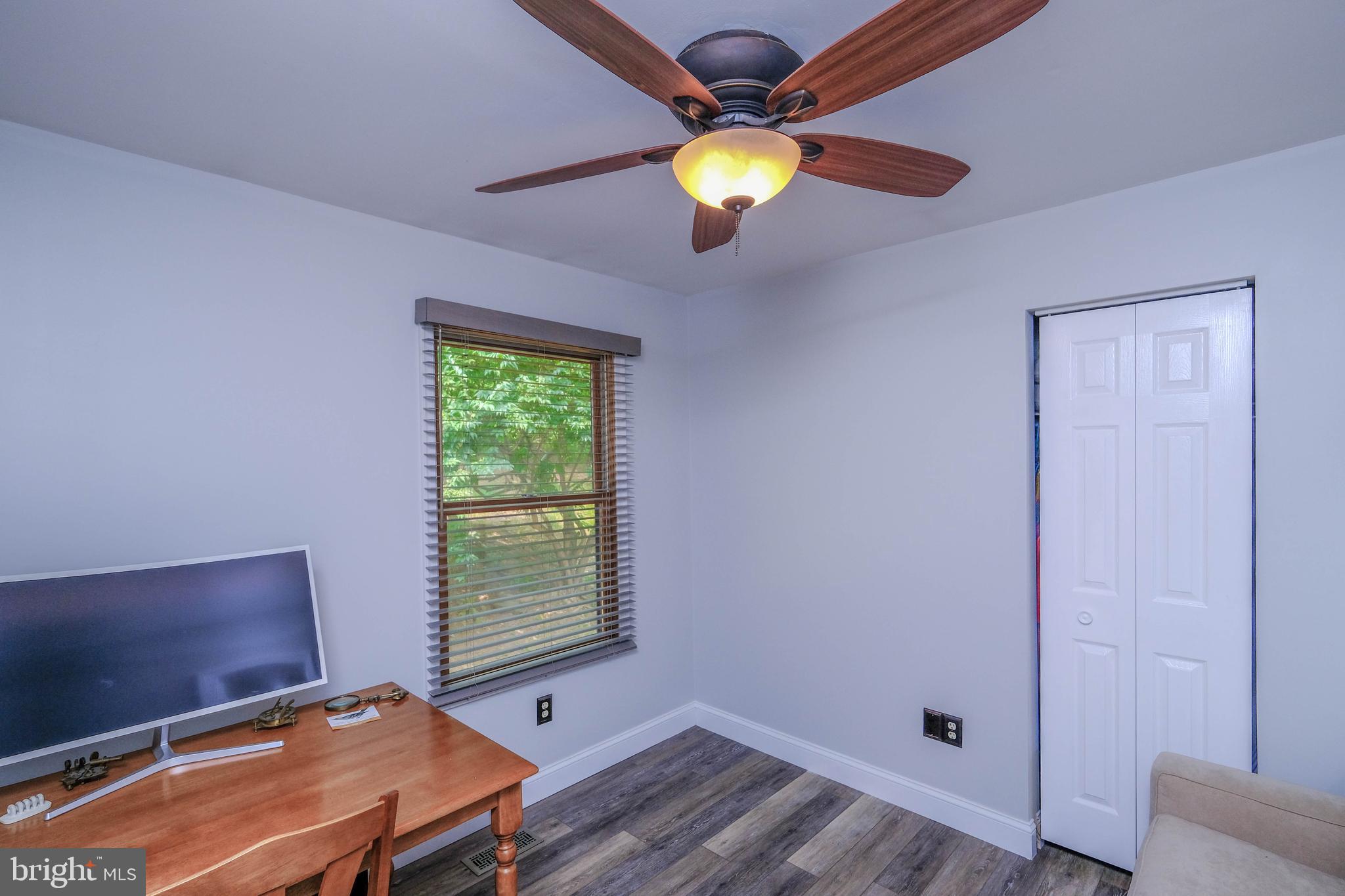 348 Rome Beauty Drive Linden, VA 22642 - Photo 40 of 80 3rd bedroom w/ ceiling fan and plank flooring