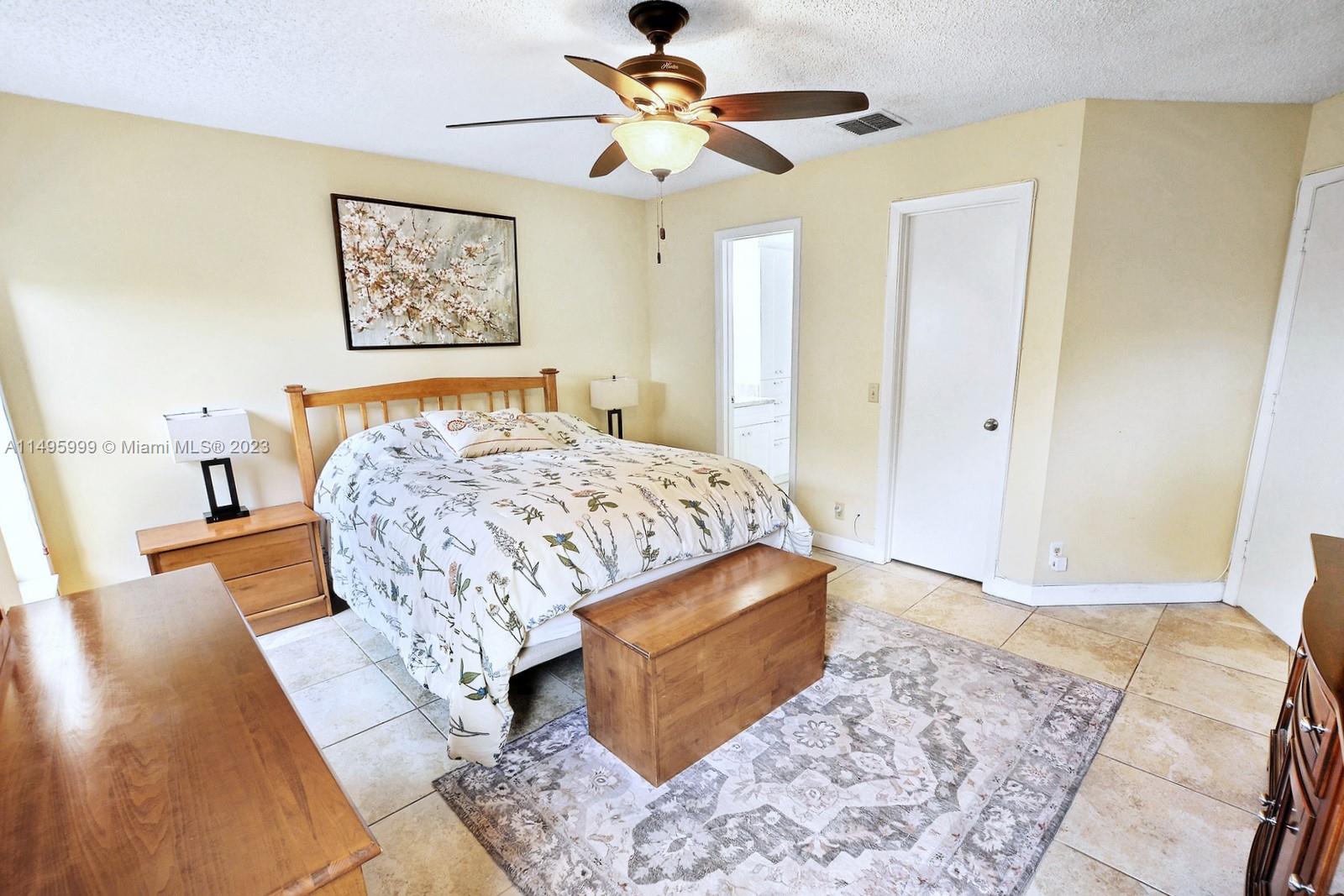 Forest Ridge Cluster Homes Davie, FL 33328 - Photo 23 of 39 a living room with furniture and a rug