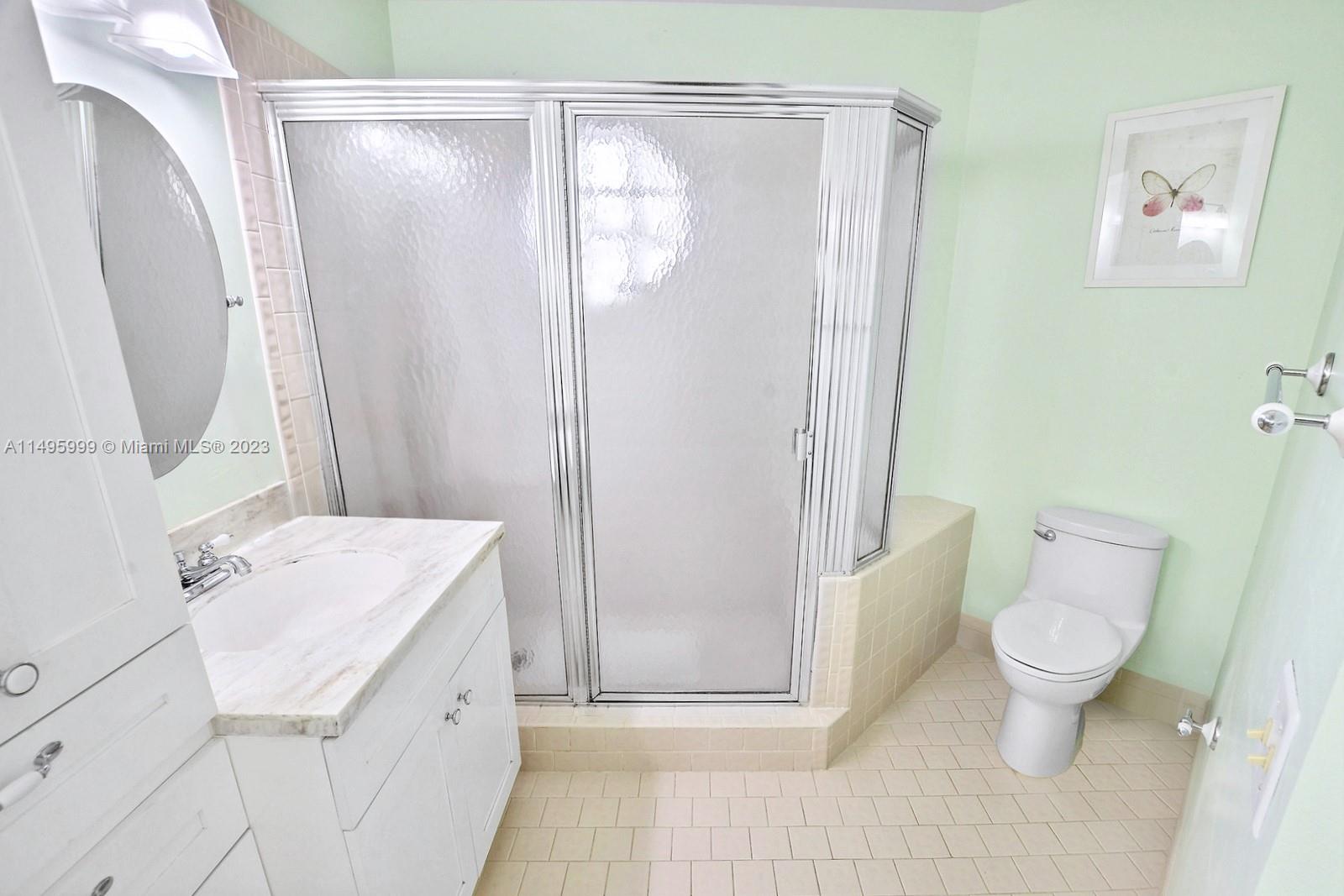 Forest Ridge Cluster Homes Davie, FL 33328 - Photo 25 of 39 a bathroom with a sink a toilet and shower