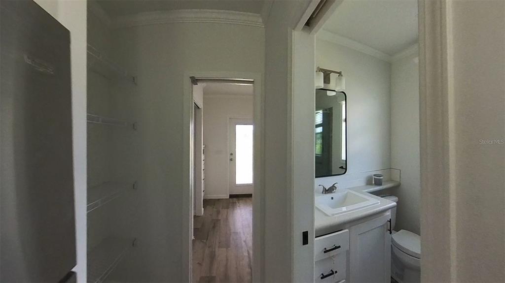 4345 Northwest 27th Place Ocala, FL 34475 - Photo 19 of 39 a bathroom with a sink a toilet and mirror