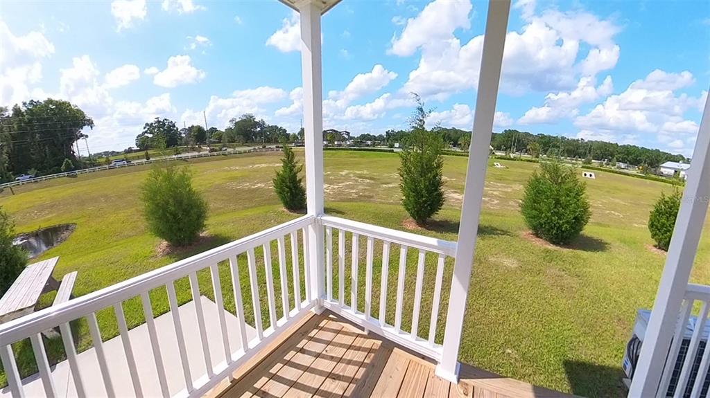 4345 Northwest 27th Place Ocala, FL 34475 - Photo 25 of 39 a view of a lake from a balcony