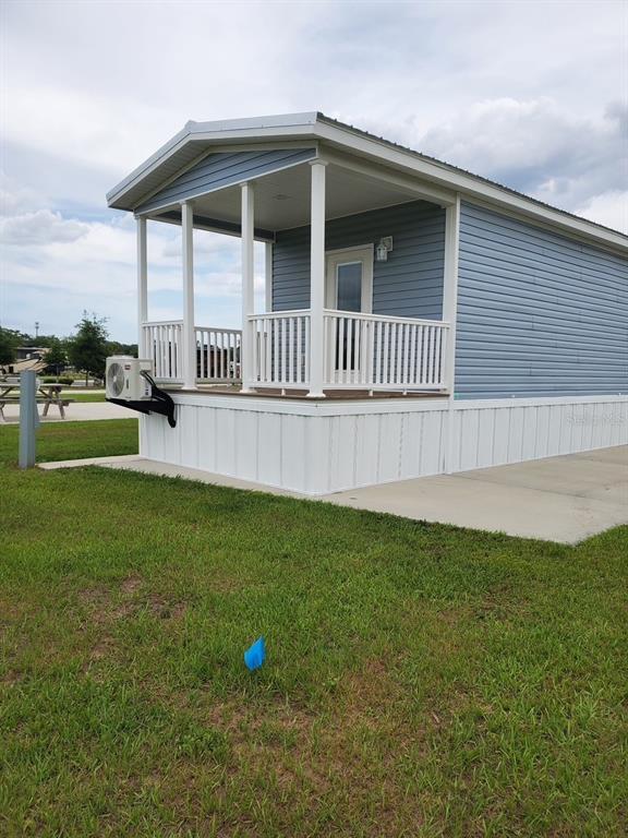 4345 Northwest 27th Place Ocala, FL 34475 - Photo 3 of 39 a view of a house with a yard