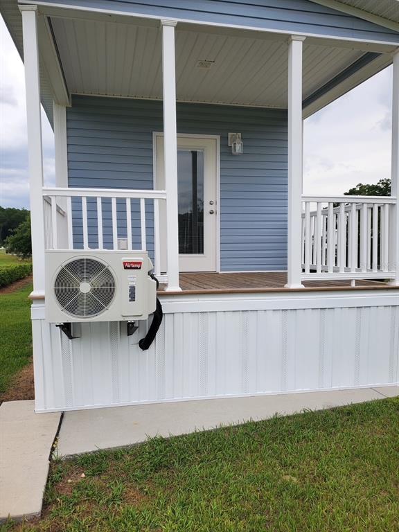 4345 Northwest 27th Place Ocala, FL 34475 - Photo 6 of 39 a front view of a house with garden
