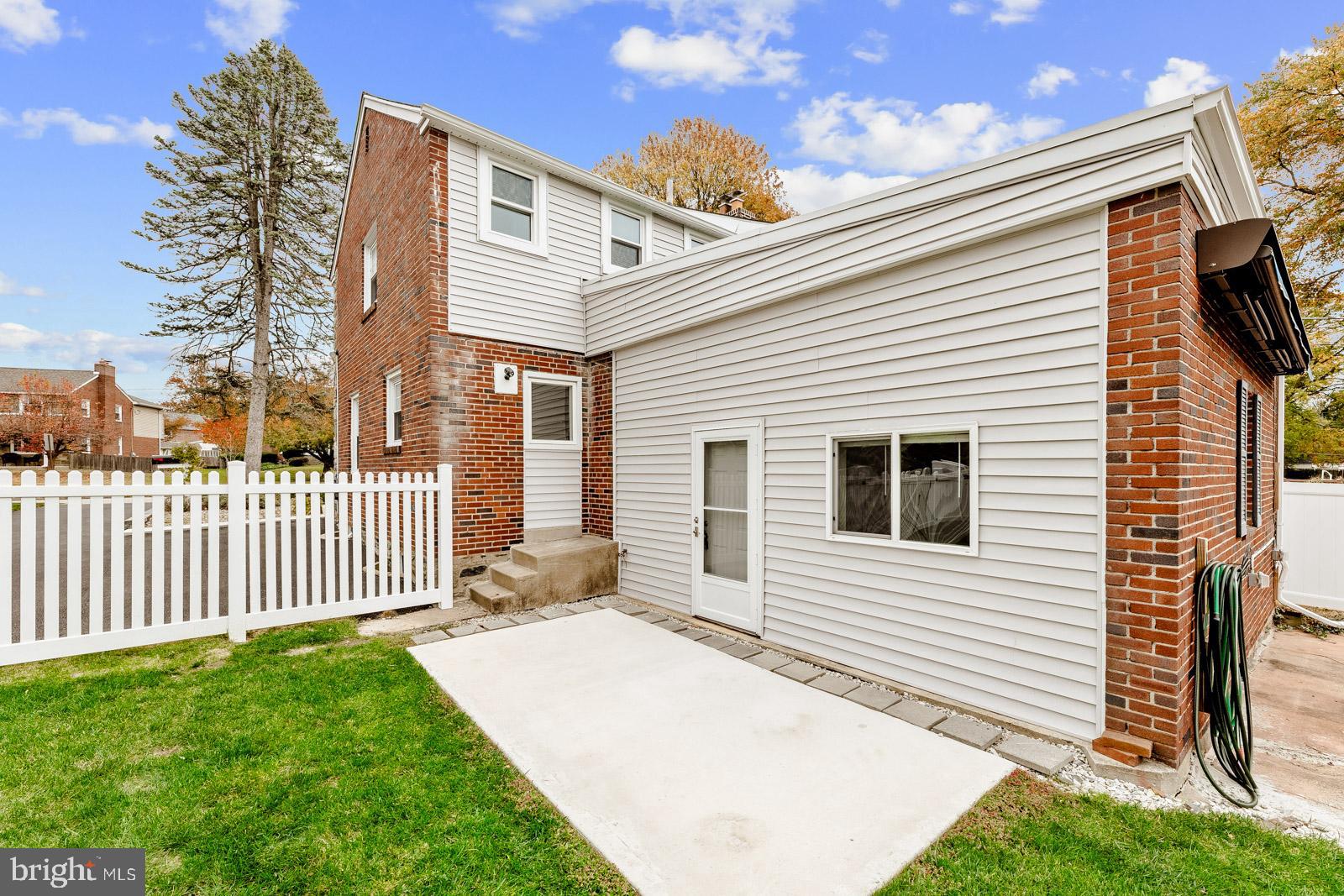 70 Meetinghouse Lane Springfield, PA 19064 - Photo 35 of 41 a view of a house with a yard