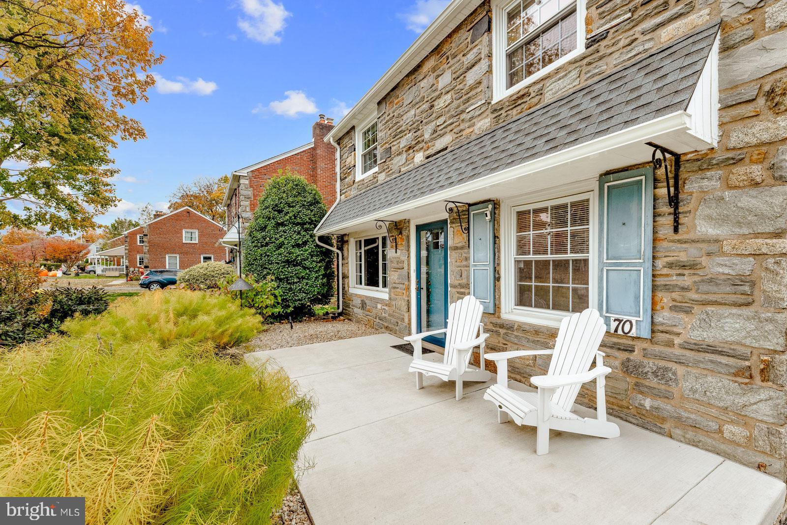 70 Meetinghouse Lane Springfield, PA 19064 - Photo 4 of 41 a building outdoor space with patio furniture and potted plants