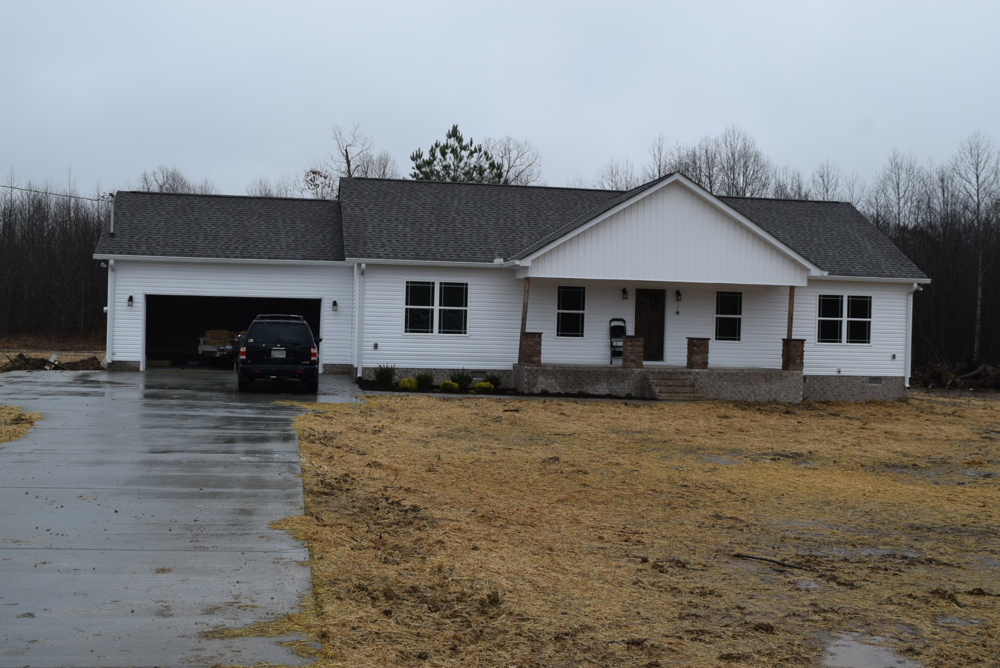 103 Ballard Road Manchester, TN 37355 - Photo 1 of 8 a front view of a house with a yard