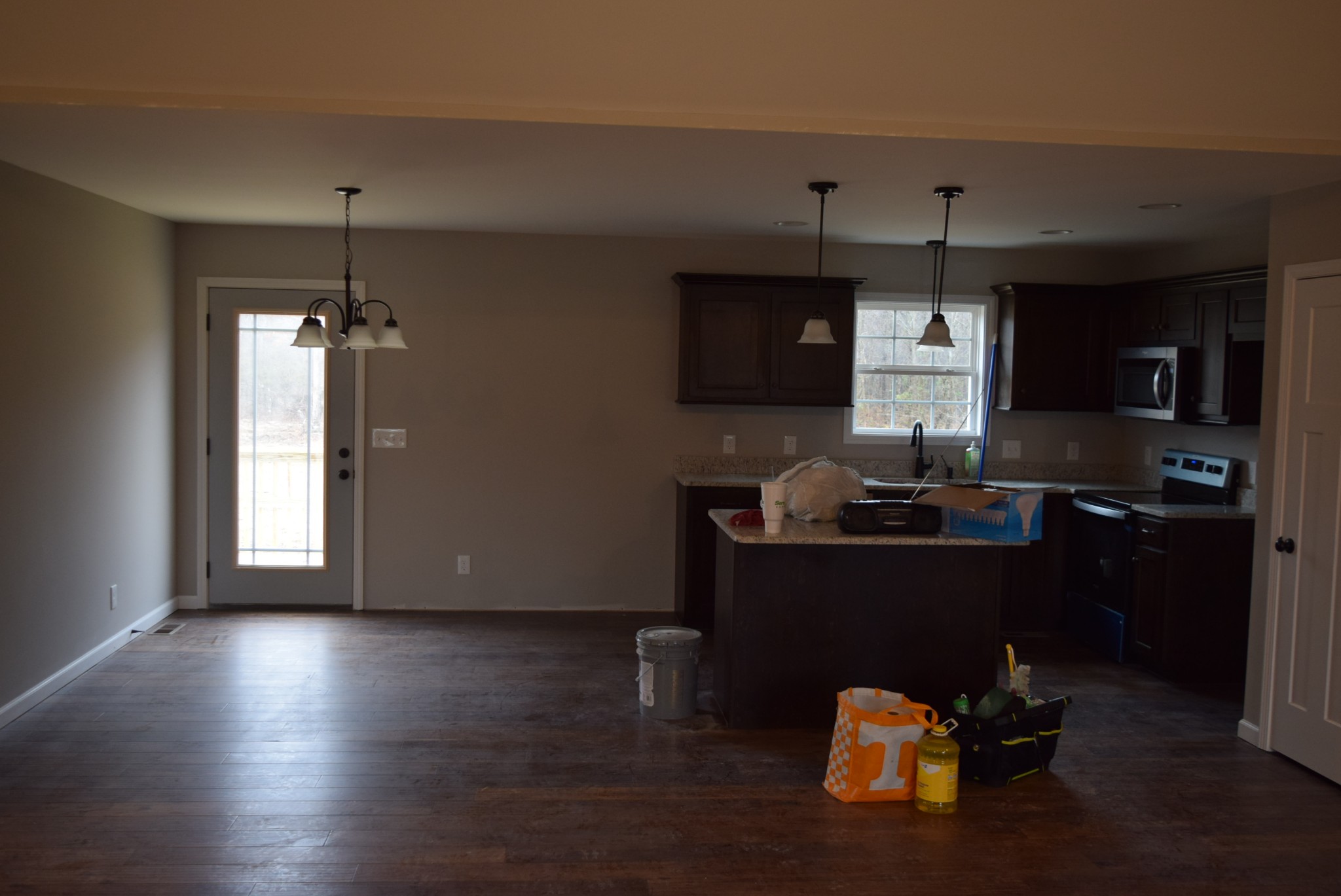103 Ballard Road Manchester, TN 37355 - Photo 2 of 8 a kitchen with kitchen island stainless steel appliances a sink stove and refrigerator