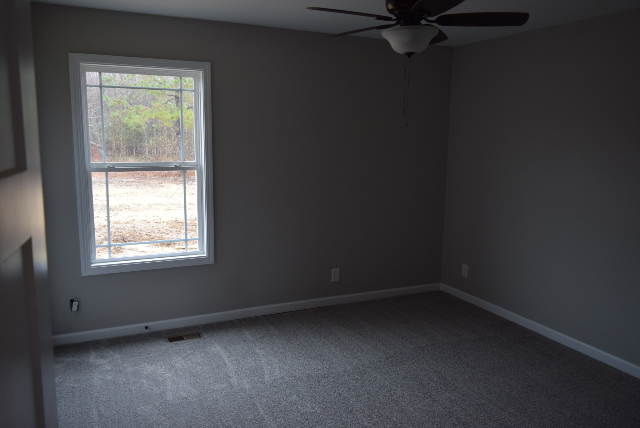 103 Ballard Road Manchester, TN 37355 - Photo 7 of 8 an empty room with a window