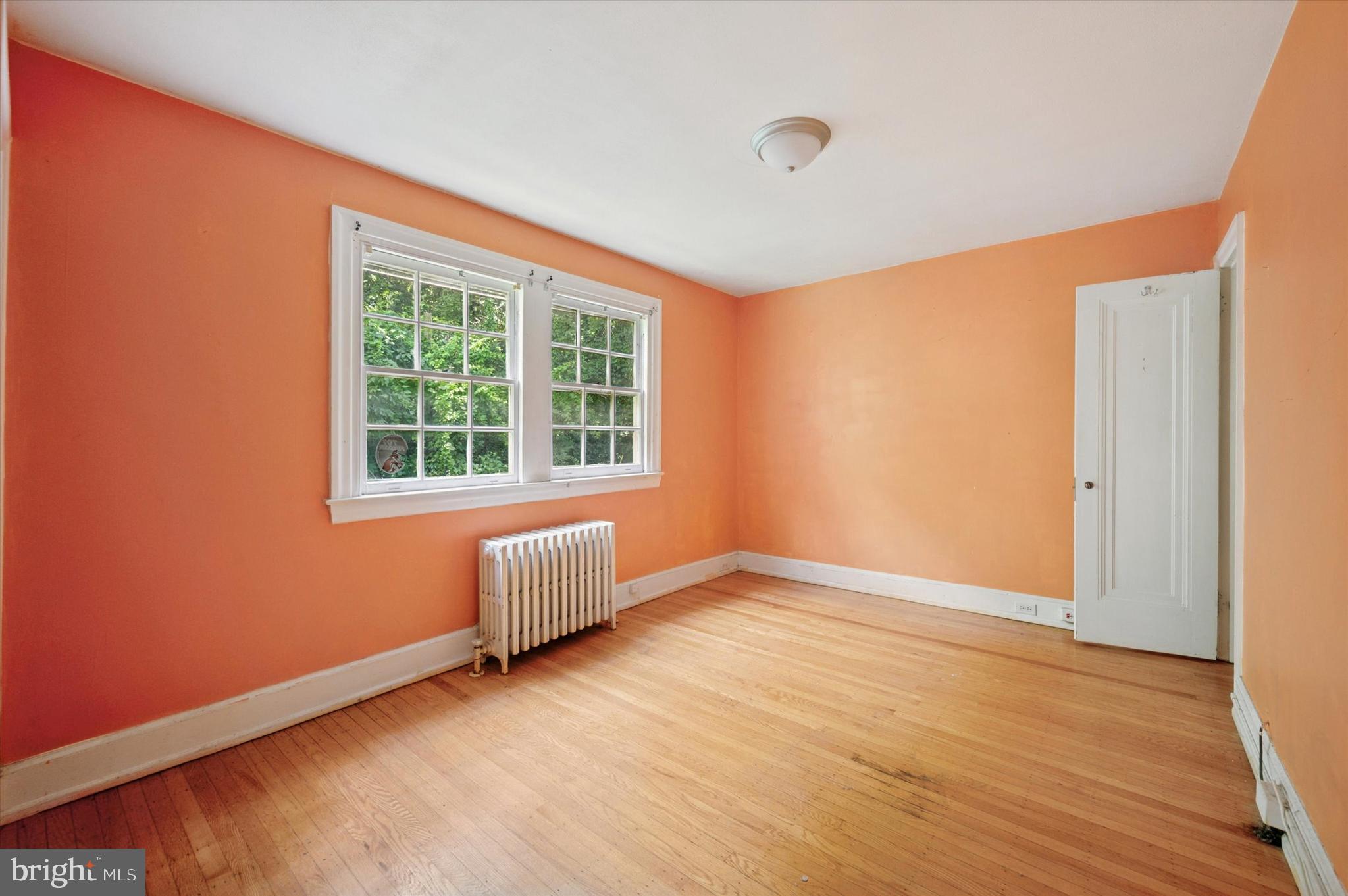 14 Rock Hill Road Bala Cynwyd, PA 19004 - Photo 9 of 15 an empty room with wooden floor and windows
