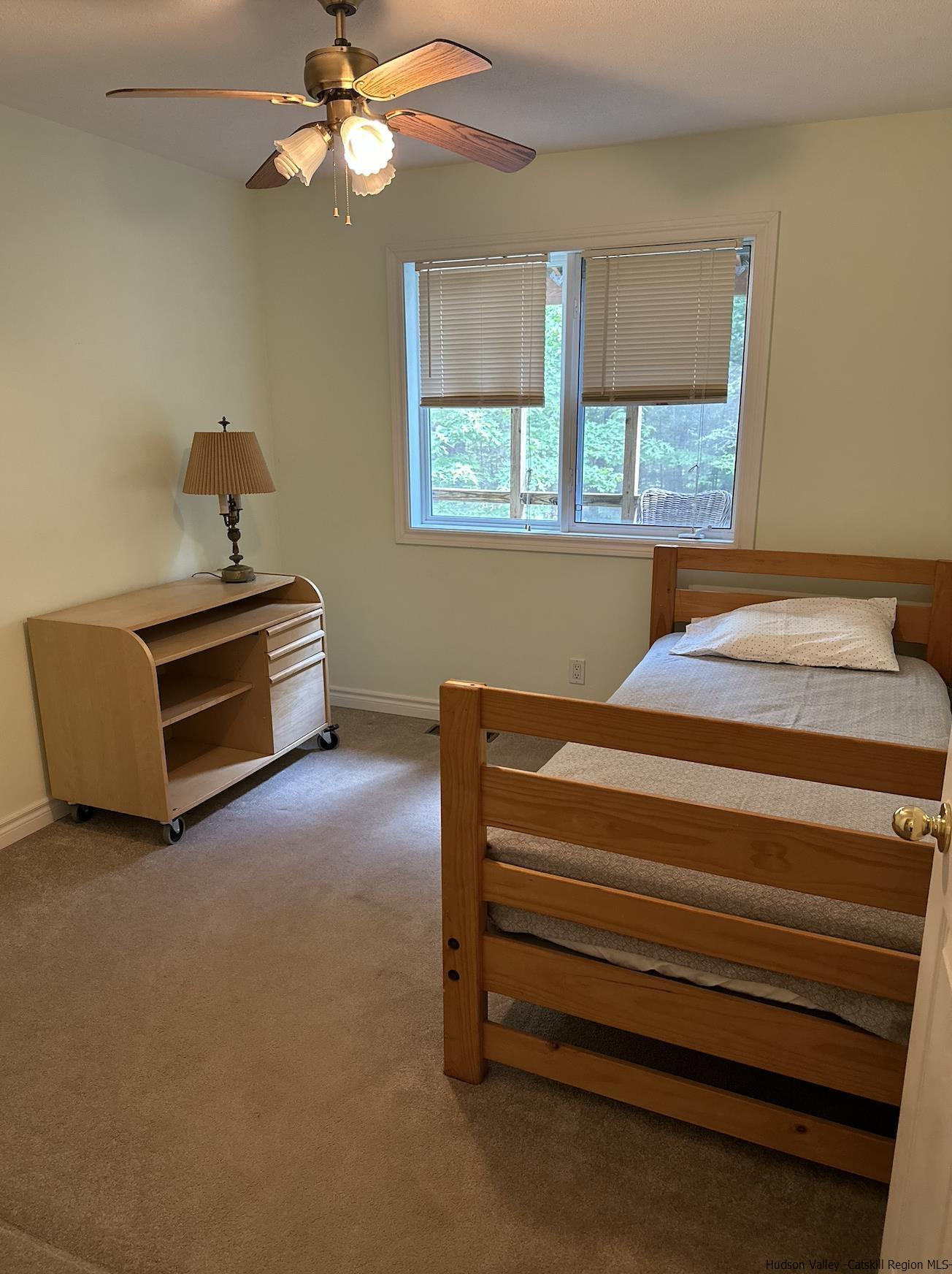 63 Lawrence Hill Road Accord, NY 12404 - Photo 15 of 19 a bedroom with a bed and a window