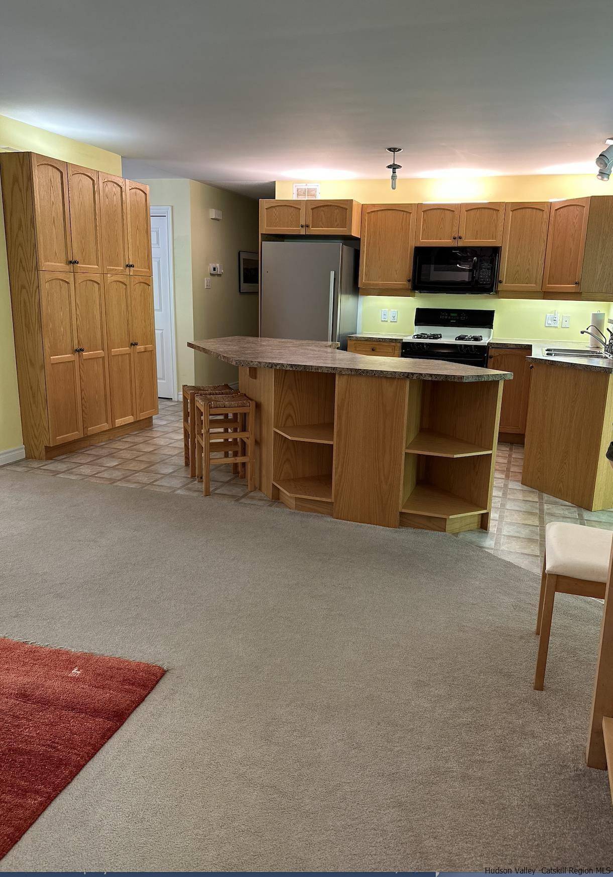63 Lawrence Hill Road Accord, NY 12404 - Photo 7 of 19 a kitchen with a cabinets and appliances