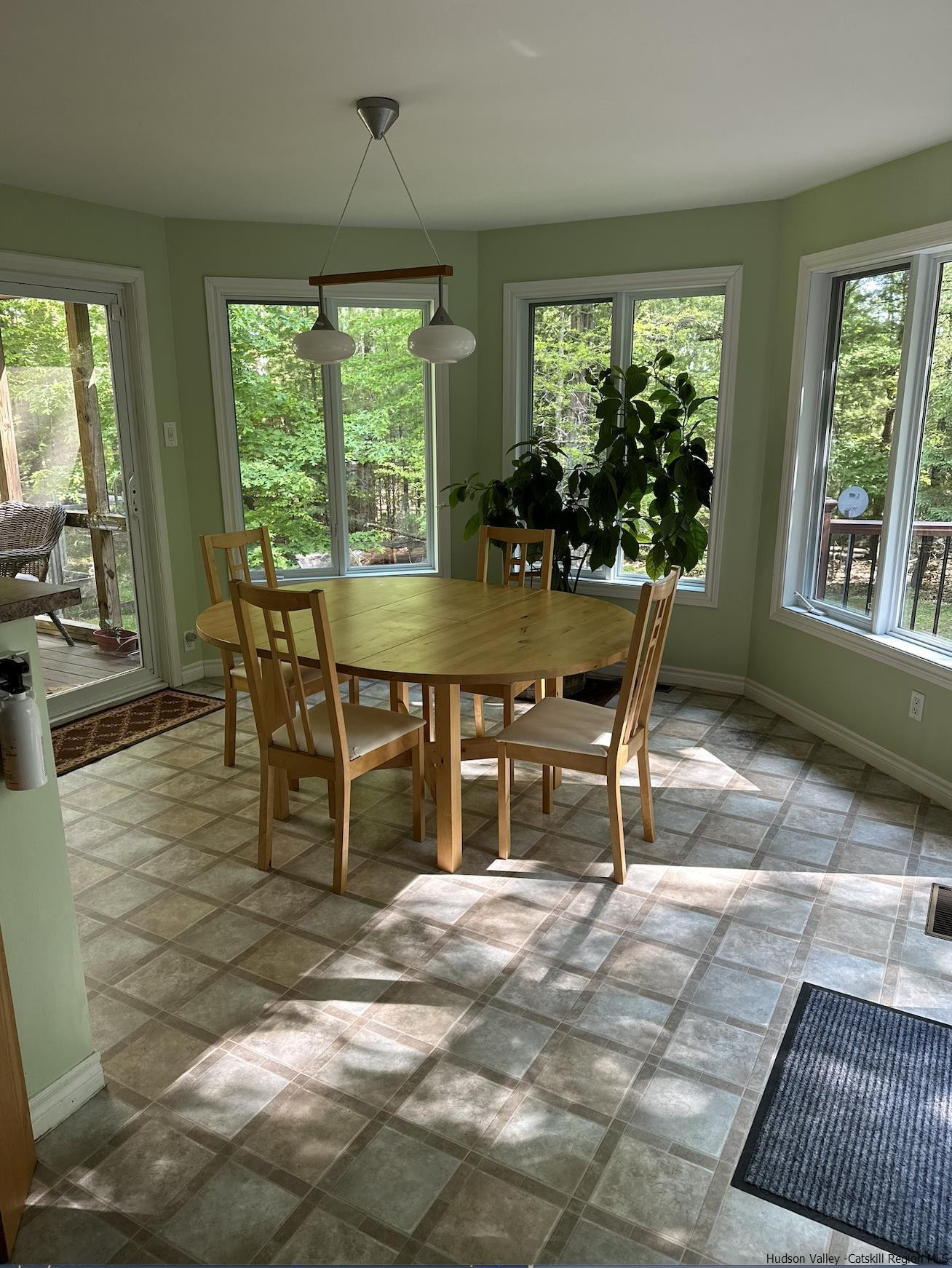 63 Lawrence Hill Road Accord, NY 12404 - Photo 9 of 19 a view of a dining room with furniture window and outside view