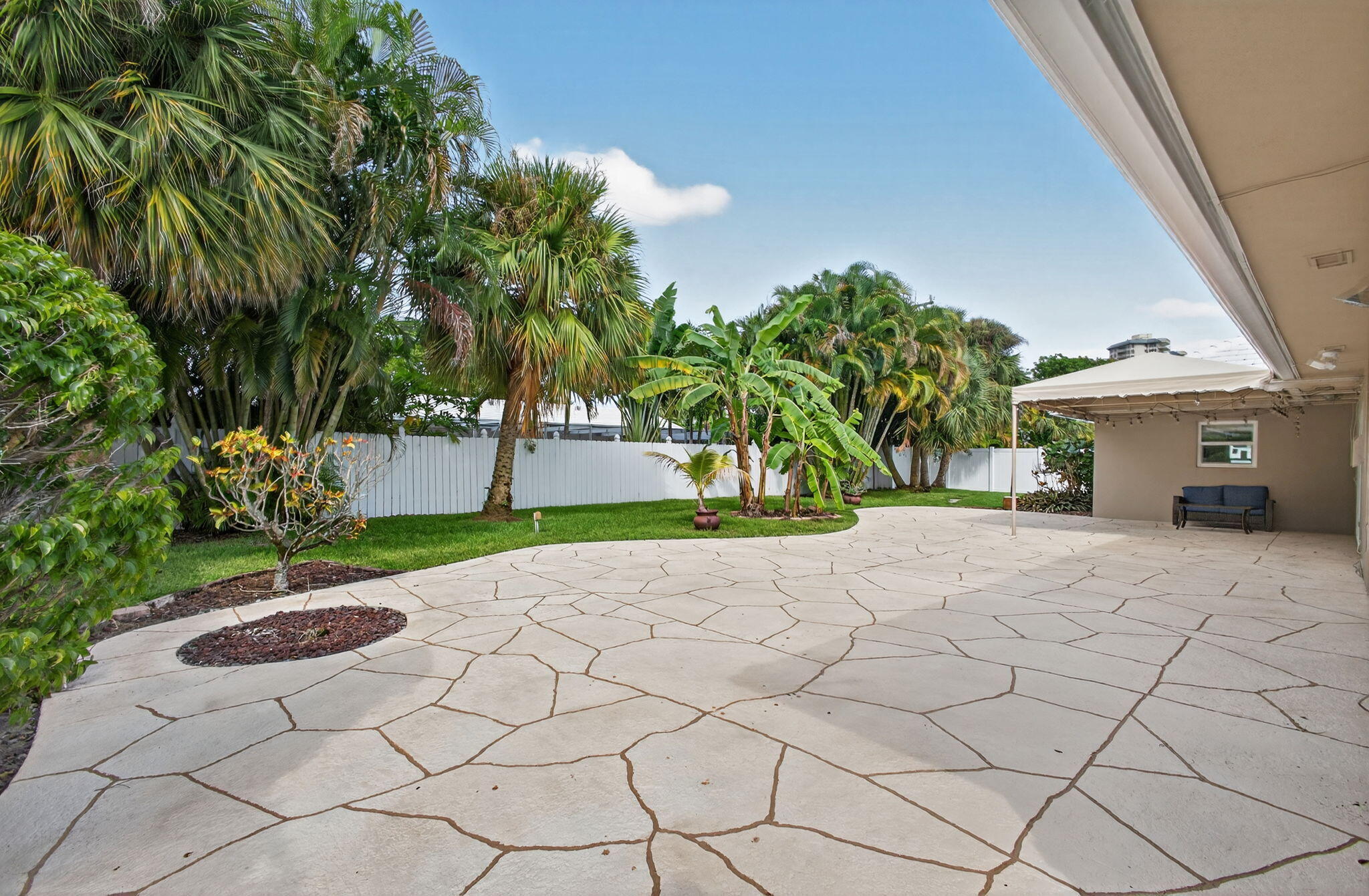 1206 Dolphin Road Singer Island, FL 33404 - Photo 54 of 65 Back Patio & Yard