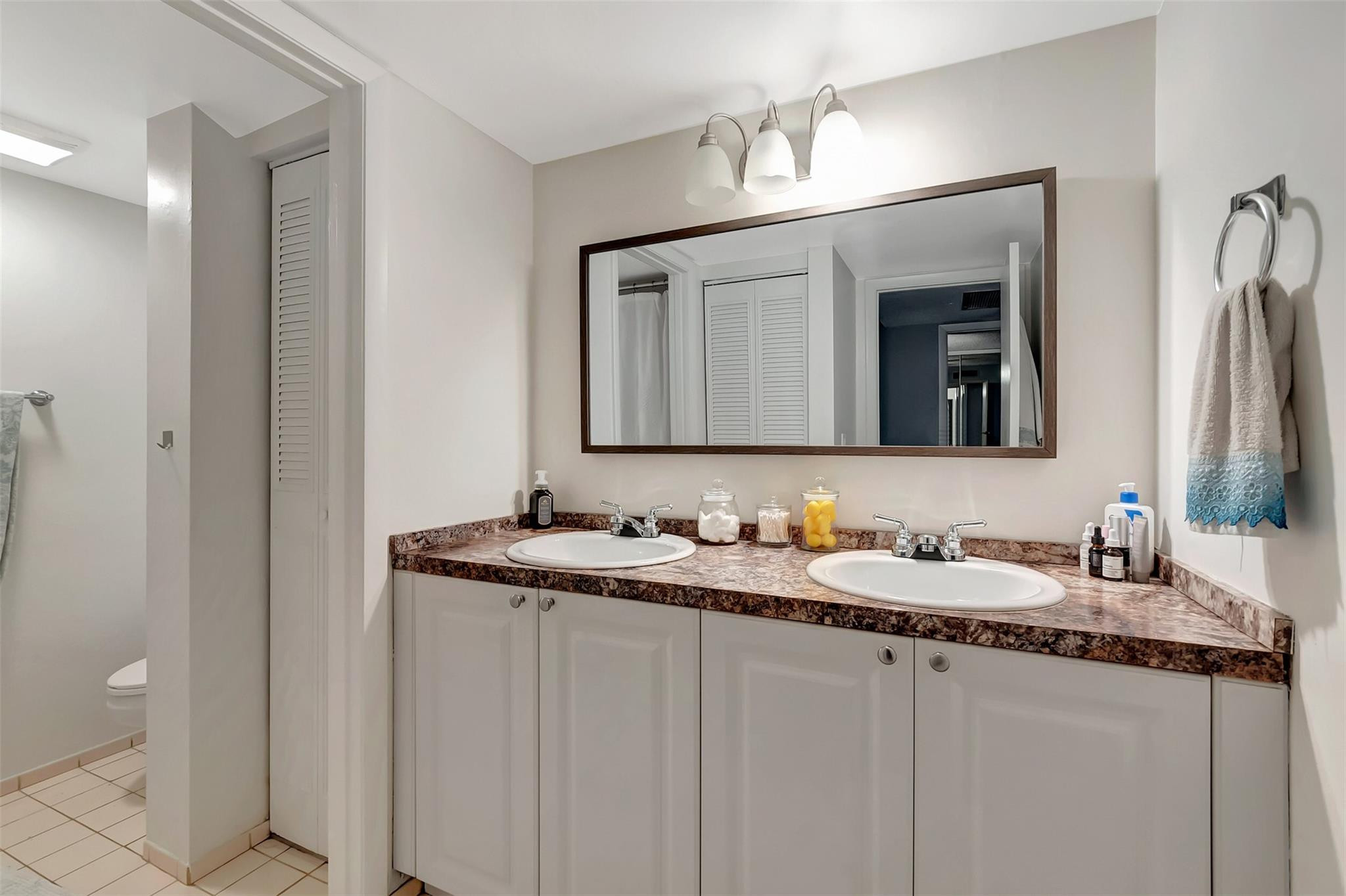 22208 Boca Rancho Drive, Unit B Boca Raton, FL 33428 - Photo 27 of 37 Dual sink second floor bathroom