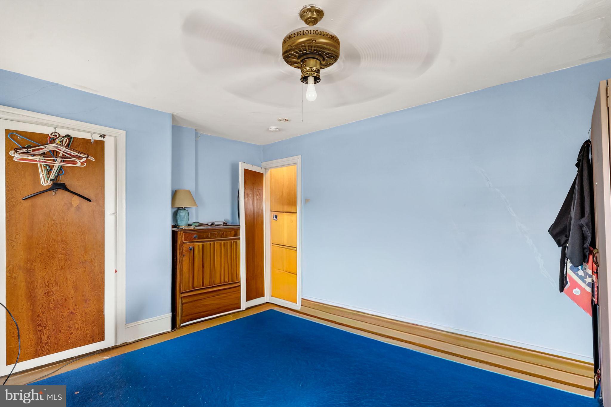 100 Penn Street Penns Grove, NJ 08069 - Photo 12 of 25 a view of an empty room with window and wooden floor