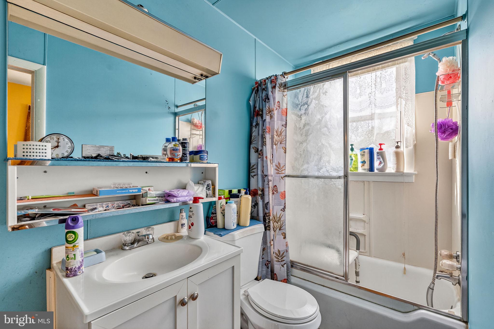 100 Penn Street Penns Grove, NJ 08069 - Photo 16 of 25 a bathroom with a sink toilet and shower