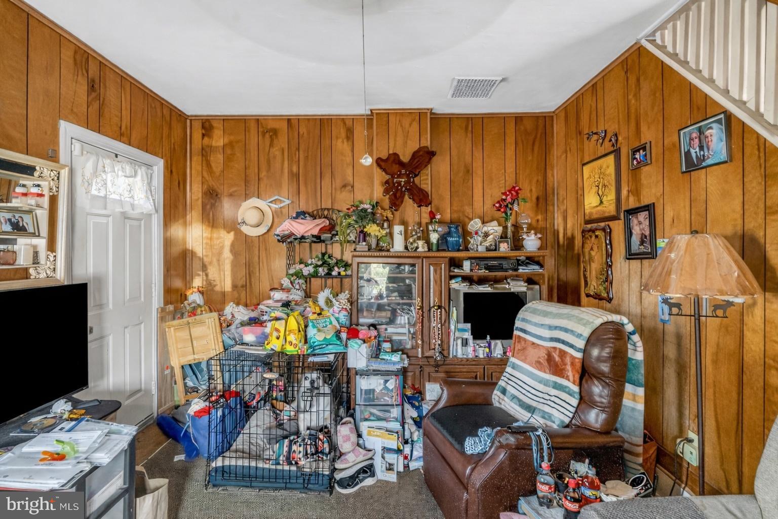 100 Penn Street Penns Grove, NJ 08069 - Photo 5 of 25 a view of entryway dining room and hall with wooden floor