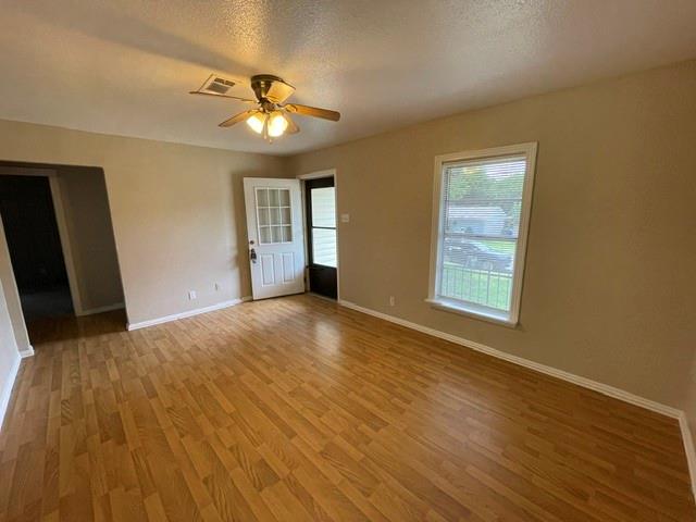 845 Rumfield Road White Settlement, TX 76108 - Photo 3 of 19 a view of an empty room with a window