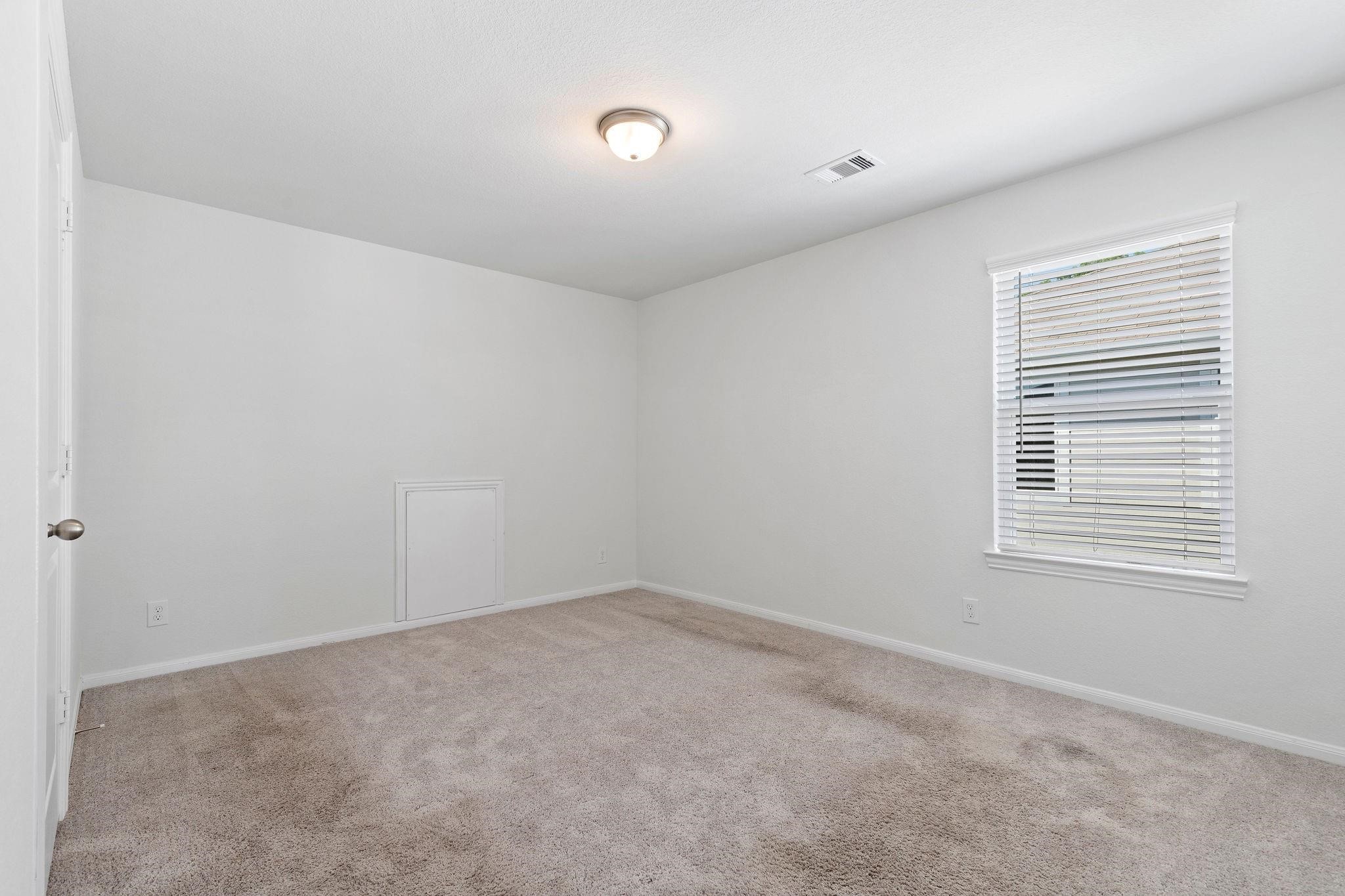5319 Rivers Edge Drive Richmond, TX 77469 - Photo 19 of 23 an empty room with a window