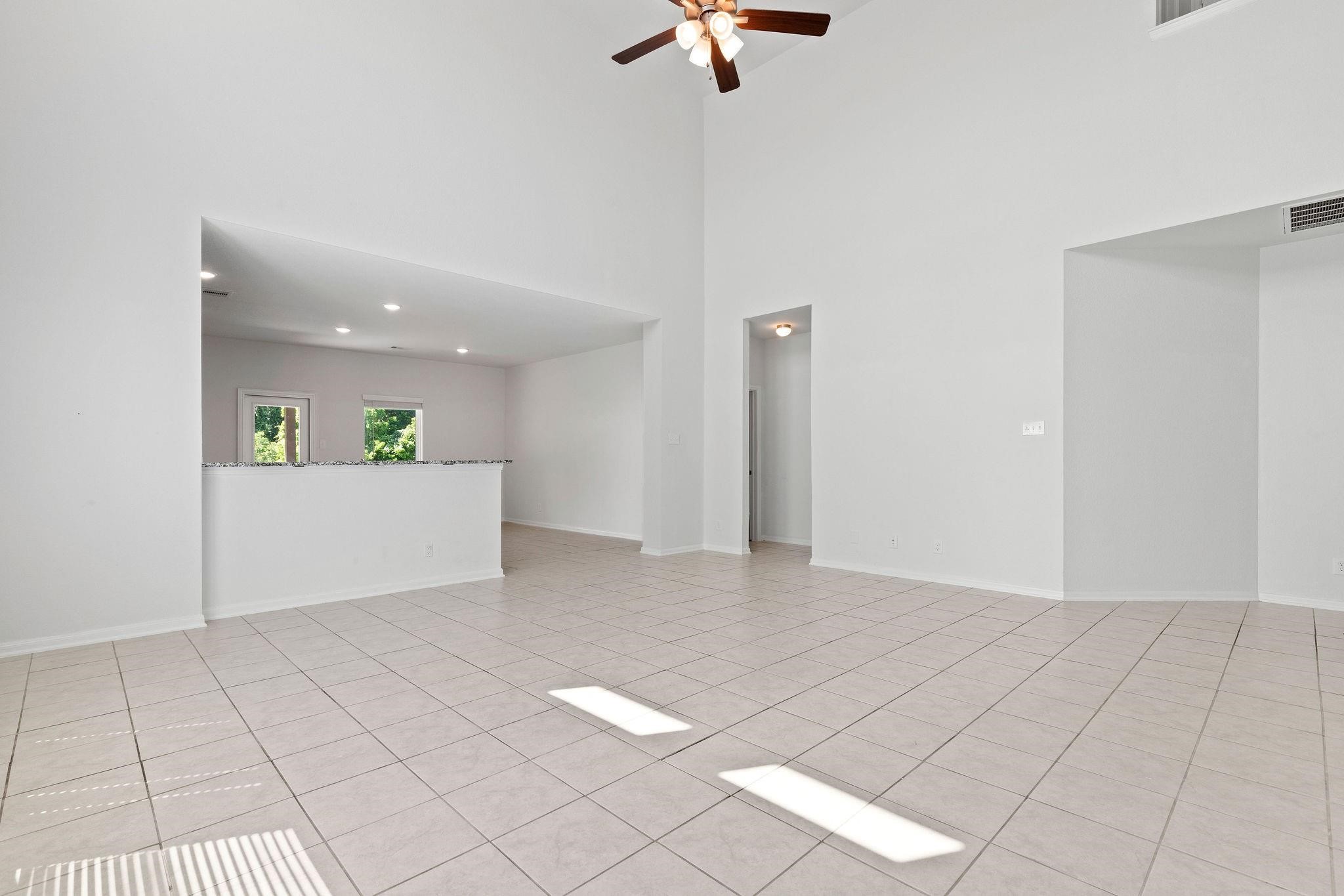 5319 Rivers Edge Drive Richmond, TX 77469 - Photo 5 of 23 a view of an empty room with a window