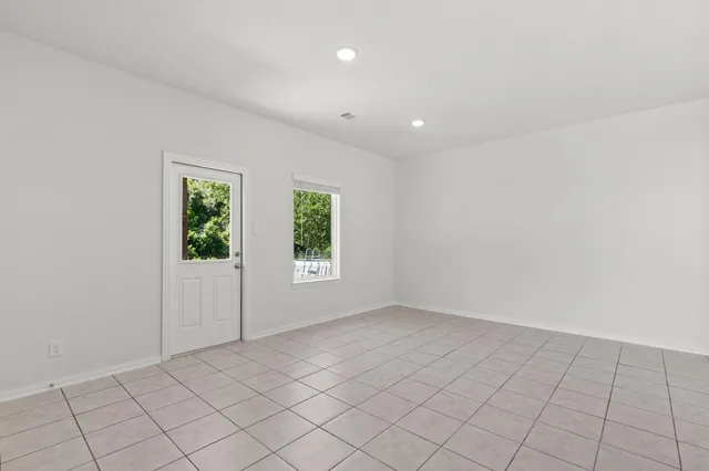 an empty room with windows