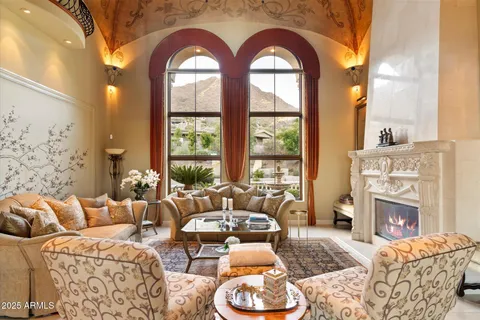 a outdoor living space with patio furniture and a fireplace