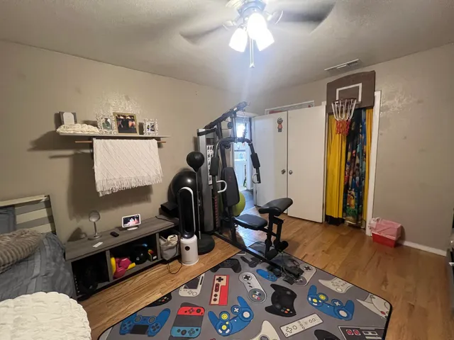 a view of a room with gym equipment