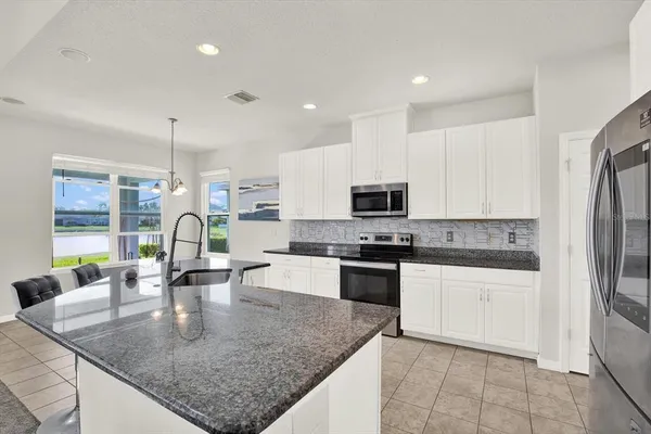 $565,000 | 9058 Spruce Creek Circle, Riverview, FL 33578