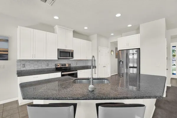 $565,000 | 9058 Spruce Creek Circle, Riverview, FL 33578