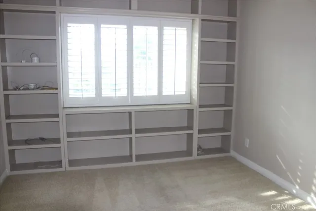 a bathroom with a sink vanity and a mirror