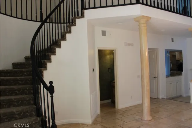 a view of entryway with a front door