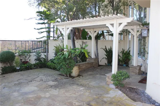 a garden view with a seating space