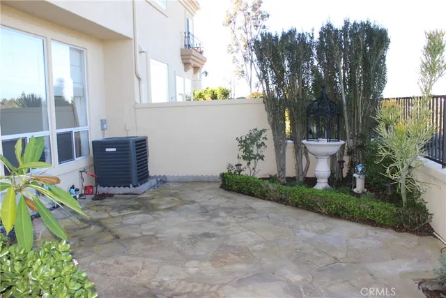 a view of a town with mountains in the background