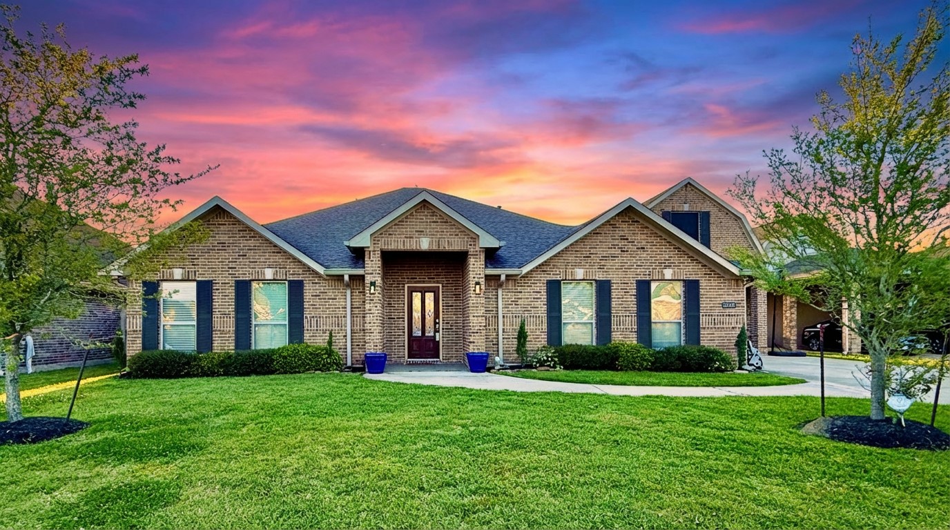 2504 Rosa Rita Drive League City, TX 77573 - Photo 1 of 44 a front view of a house with a yard